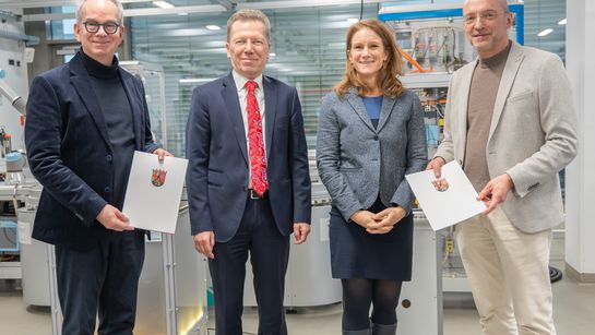 Prof. Hans Dieter Schotten, CFO Helmut Ditzer, Ministerial Director Katharina Heil, Prof. Andreas Dengel