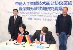 Pekinger Vize-Bürgermeister besucht DFKI Berlin: Kooperationsvertrag besiegelt verstärkte Zusammenarbeit mit AITC China